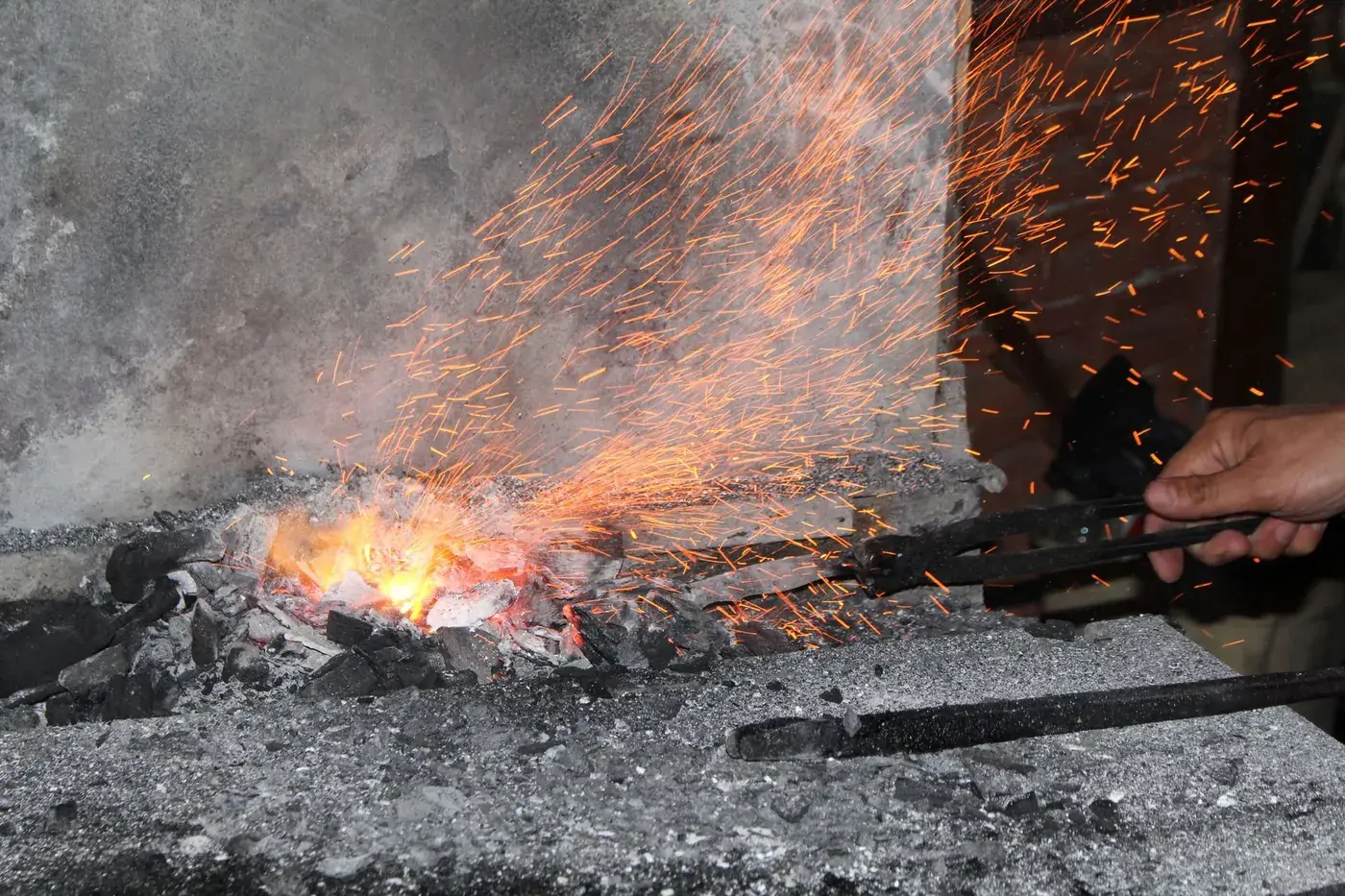 A blade heating in a forge fire