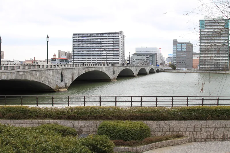 The six stone arches of Bandai Bridge over the Shinano River in Niigata at dusk